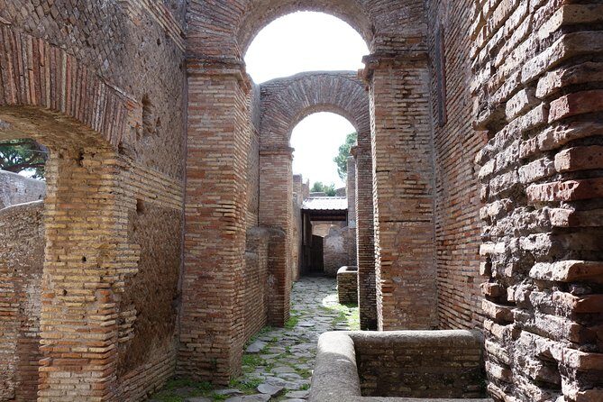 Ancient Ostia Antica Semi-Private Day Trip from Rome by Train with Guide - The 2.5-hour ruin walk: Decumanus Maximus to the Baths of Neptune
