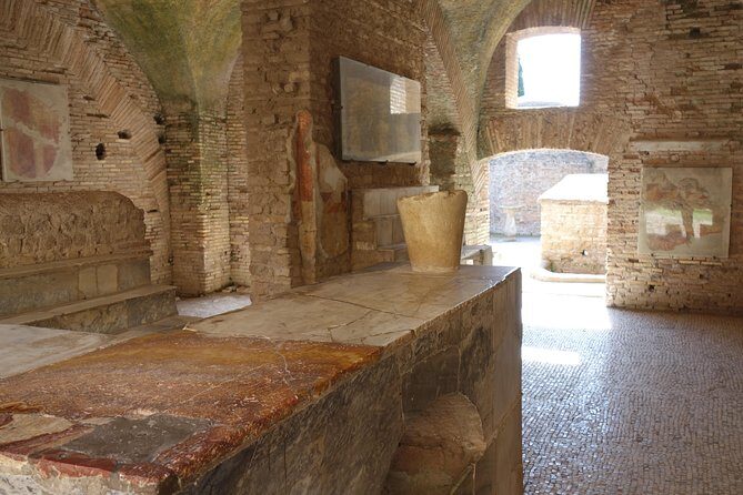 Ancient Ostia Antica Semi-Private Day Trip from Rome by Train with Guide - Streets, shops, and homes: how Ostia looked as a working city