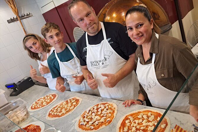 Cooking Class in the Heart of Rome: Pizza and Tiramisu Making - Baking, Then Sitting Down: Wine, Limoncello, and What Comes With It