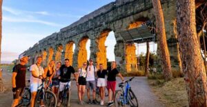 Rome: Appian Way & Catacomb Sunset E-bike Tour with Aperitif - Porta San Sebastiano: the short bridge from modern Rome to ancient Rome