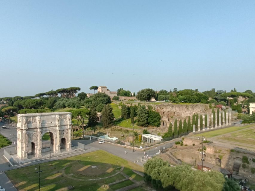 Rome: Colosseum, Palatine Hill, & Roman Forum Walking Tour - Headsets, group size, and guide style that keeps pace