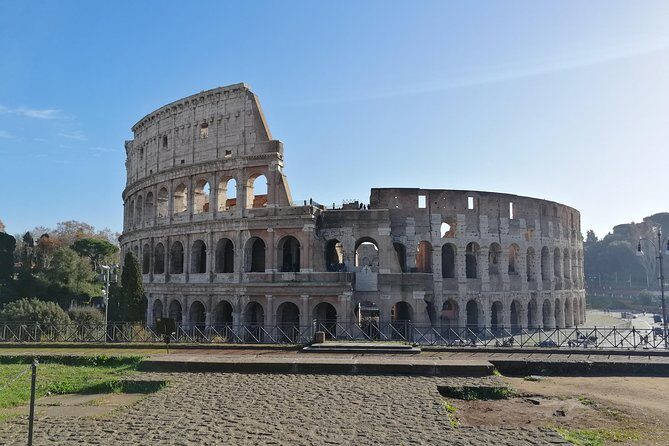 Rome: Colosseum, Roman Forum and Palatine Hill Private Tour - Forum of Caesar and Temple of Vesta: circular, political, and symbolic
