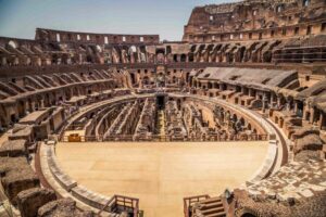 Rome: Colosseum Tour with Access to the Gladiator Arena - Entering through the gladiator gate and the Libitina passage