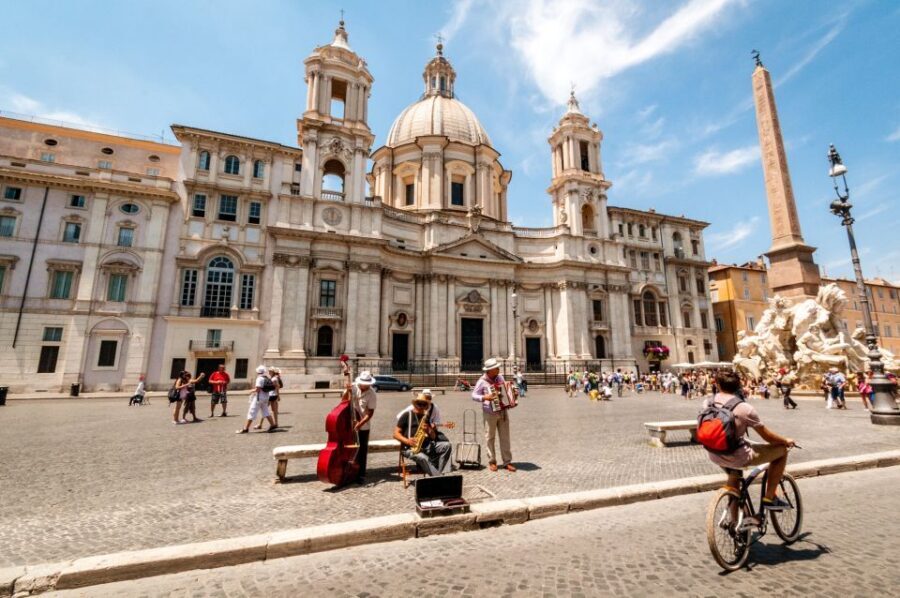 Rome: Highlights Bike Tour - Colosseum zone finish: the most famous silhouette, from the right angle