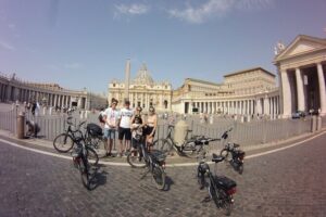 Rome Highlights by E-Bicycle Small group - Stop 1: The Roman Forum crossing and Trajan Market views