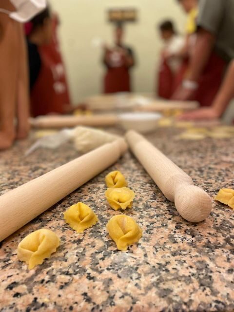 Rome: Pasta Making Class with Wine, Limoncello, and Dessert - The Meal Moment: Communal Table, Wine, and Limoncello