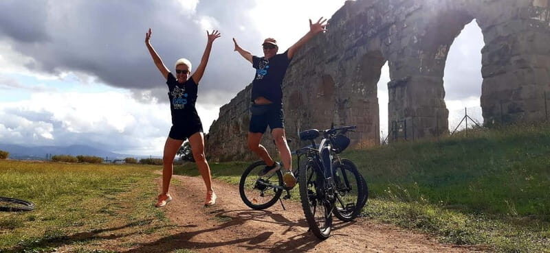 Rome:Appian Way E-bike Tour, Catacombs, Aqueducts & Transfer - Cycling the Via Appia Antica: tombs, photos, and that famous paving