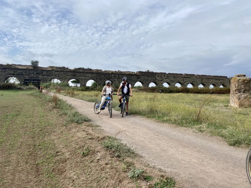 Rome:Appian Way E-bike Tour with Catacombs, Aqueducts & Food - Parco degli Acquedotti: the aqueducts feel bigger when you’re riding