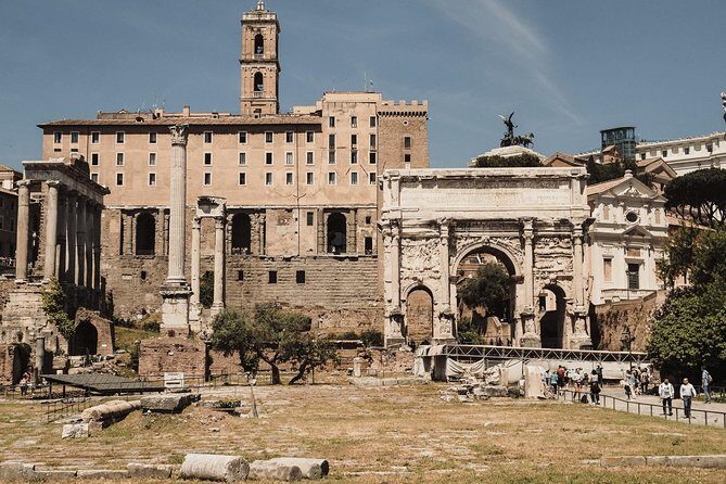 Small-Group Colosseum Tour with Roman Forum & Palatine Hill - Inside the Colosseum: reserved entry, tiers, stairs, and gladiator details